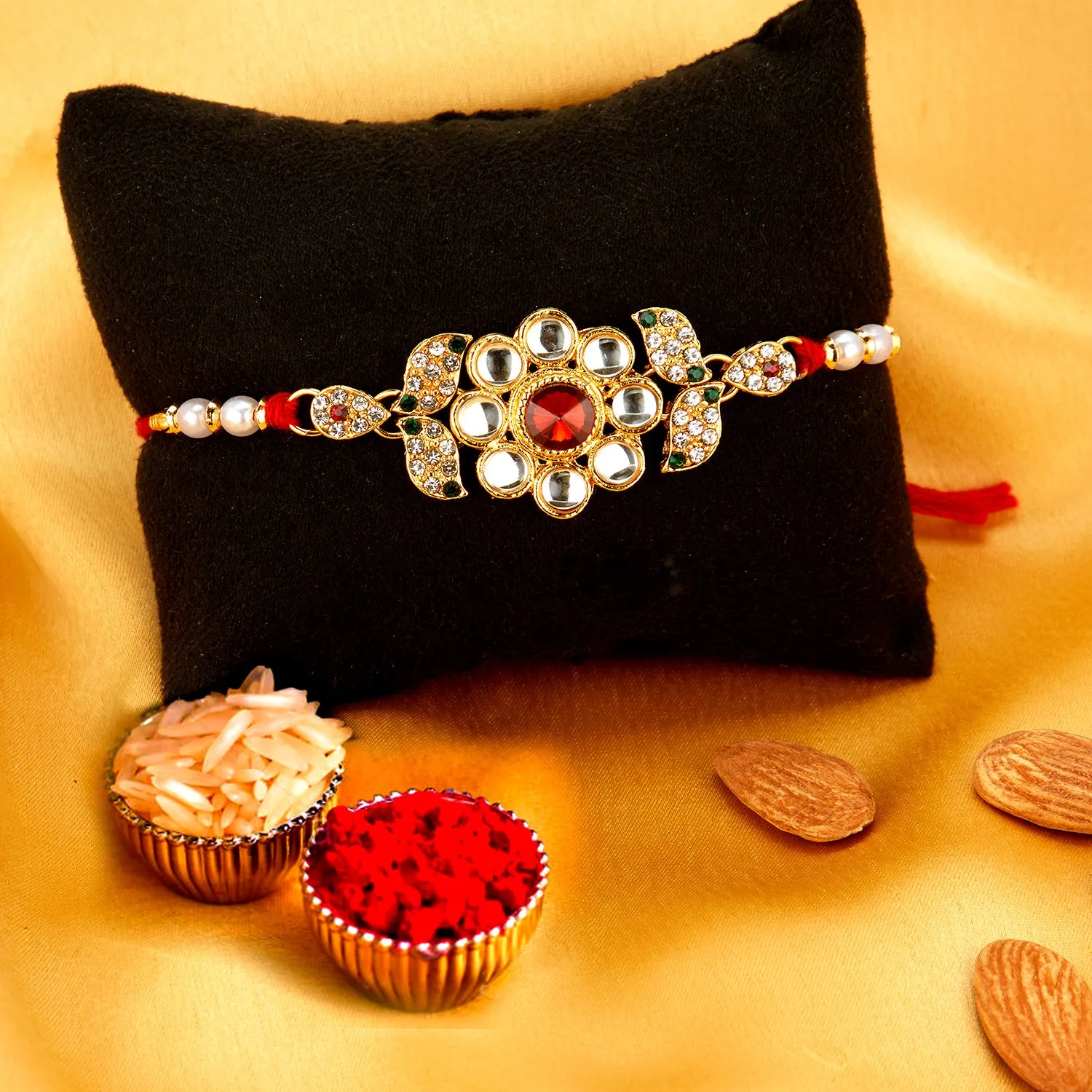 Sukkhi Amazing Gold Plated Floral Rakhi with Roli Chawal and Raksha Bandhan Greeting Card for Men