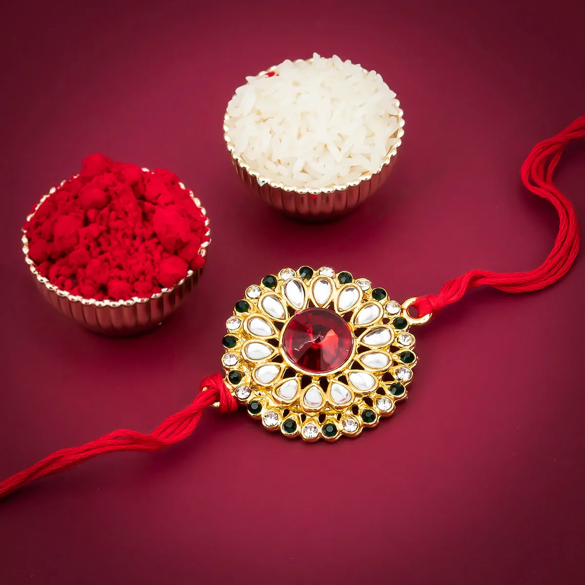 Sukkhi Blossomy Designer Floral Gold Plated rakhi with Roli Chawal and Raksha Bandhan Greeting Card For Men